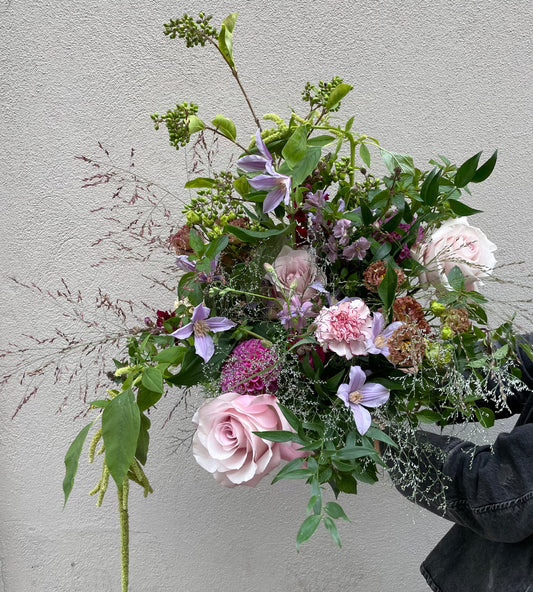 Bukett i rosa och bleklila.